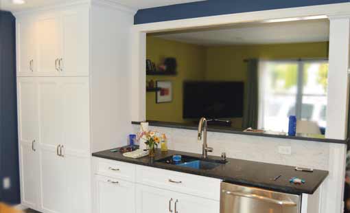 Batch Building & Remodeling: Proven Quality | White Kitchen Remodel with stainless steel appliances